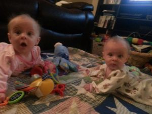 twin baby stealing her sister's toys