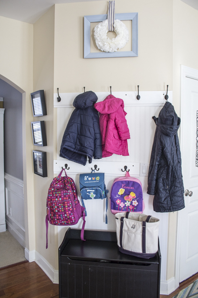 tips for keeping a tidy home-organized mud area entryway